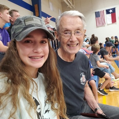 Sharon Hockensmith’Grace and Papa at Volleyball Ga