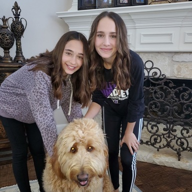 Grace with Sister Caitlin and dog Cooper.jpeg